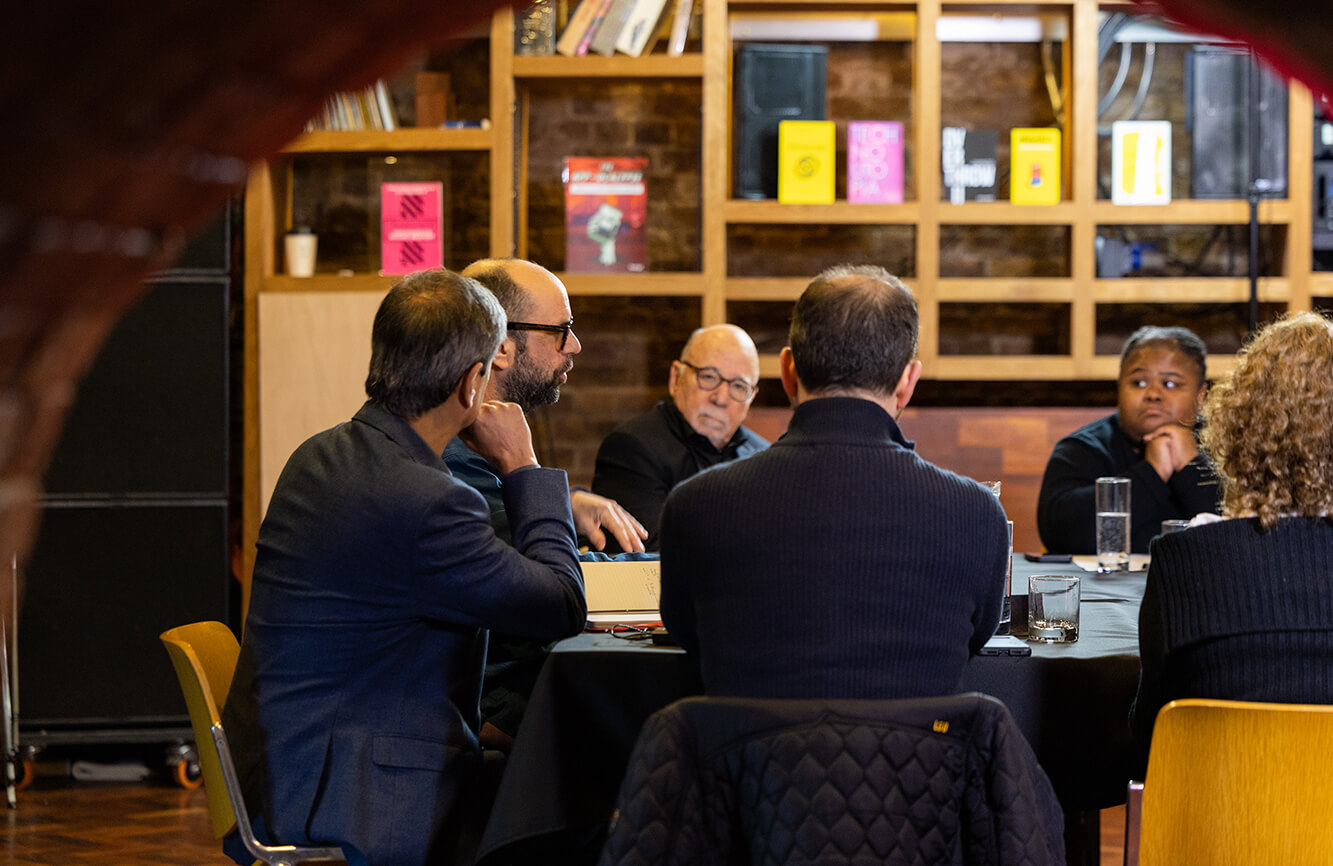 Group of people having a meeting at a table